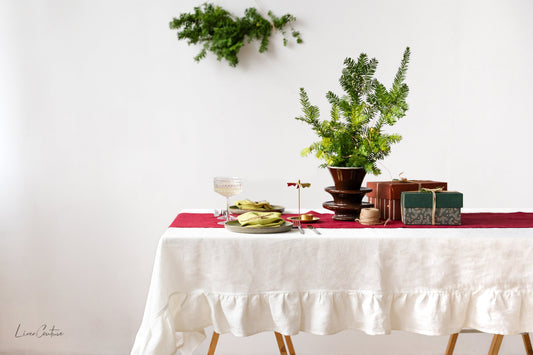 White linen tablecloth with ruffles